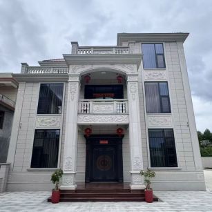 阜新 芝麻白石材别墅干挂案例展示